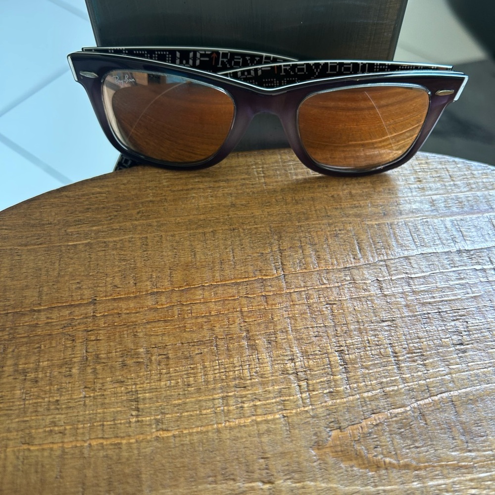 Ray-Ban Wayfarer sunglasses.